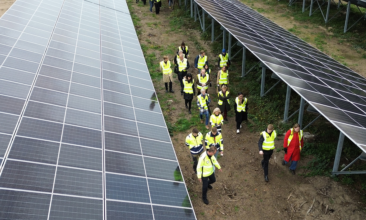 Drone image of visitors amongst panels at Studsvik