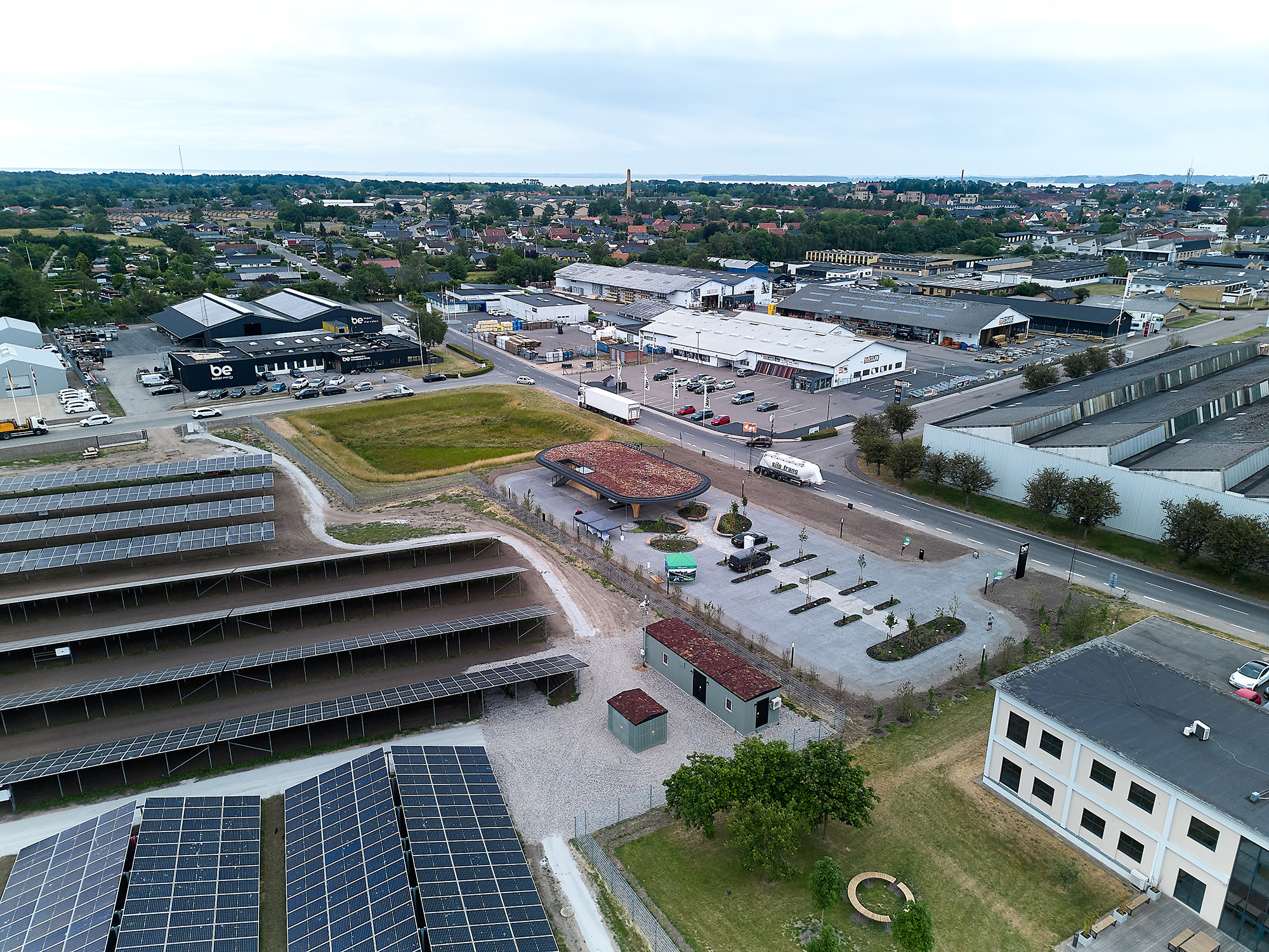 Drone shot of office bulding and solar park)